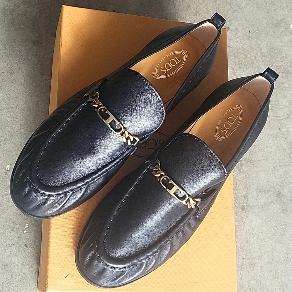 TOD'S women's black leather loafers with rubber sole, size 8.5